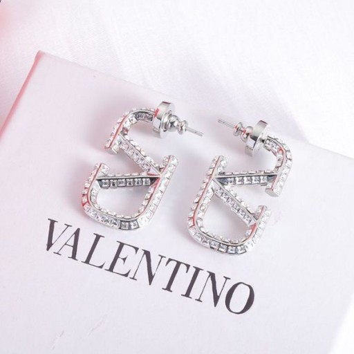 Valentino小VLogo署名のイヤリングで金属とRhinestones銀