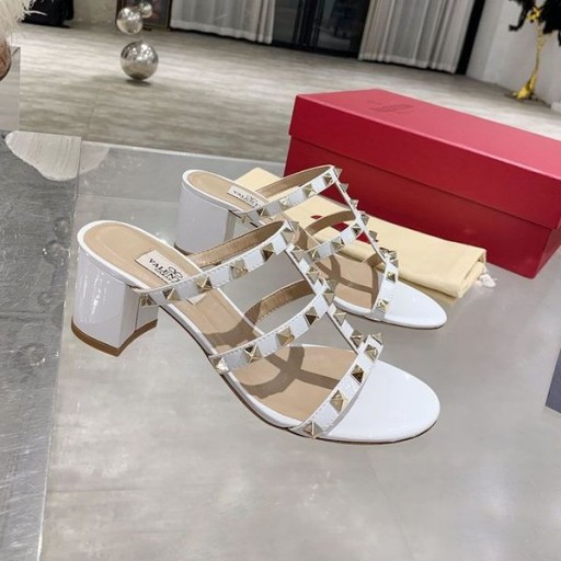 발렌티노 Rockstud 두꺼운 굽 슬라이드는 여자 가죽색