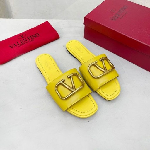 Valentino VLogo Firma De Diapositivas De Las Mujeres De Piel De Becerro De Color Amarillo