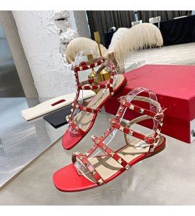 Valentino Rockstud Sandalias Planas Con Correa En El Tobillo De Las Mujeres De Piel De Becerro Rojo