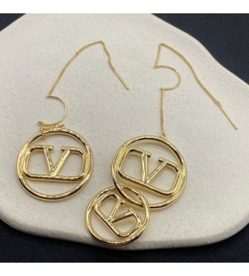Valentino VLogo Firma Asimétrica Cuelgan Aretes De Metal De Oro